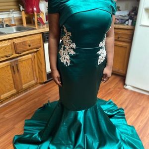 Green mermaid style evening gown